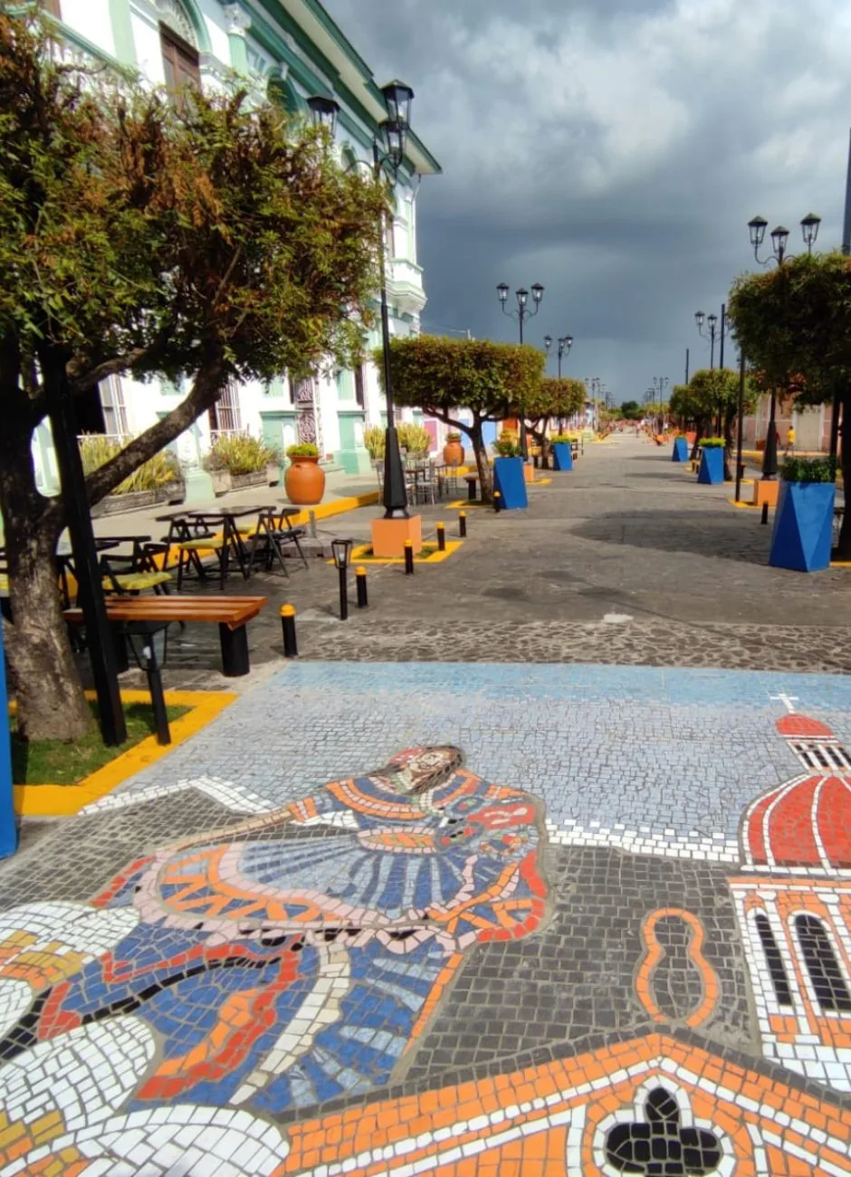Folk-art mosaic tiles on a pedestrian street Granada, Nicaragua